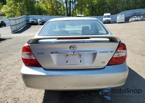 2004 Toyota Camry Le from USA, damaged, VIN 4T1BF30K14U579715